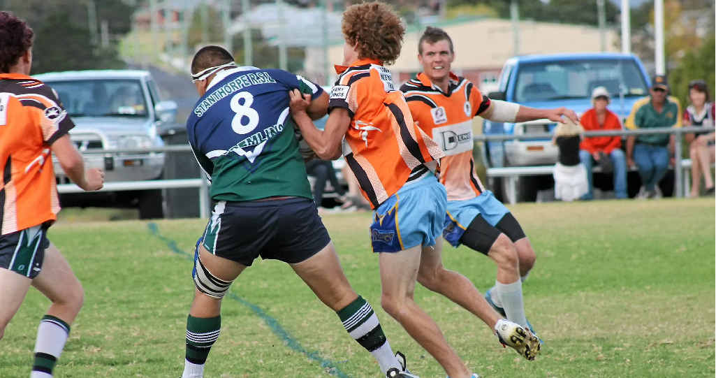 GOOD RUN: Leon Karena is brought down by the Rams defence. GOOD RUN: Leon Karena is brought down by the Rams defence.